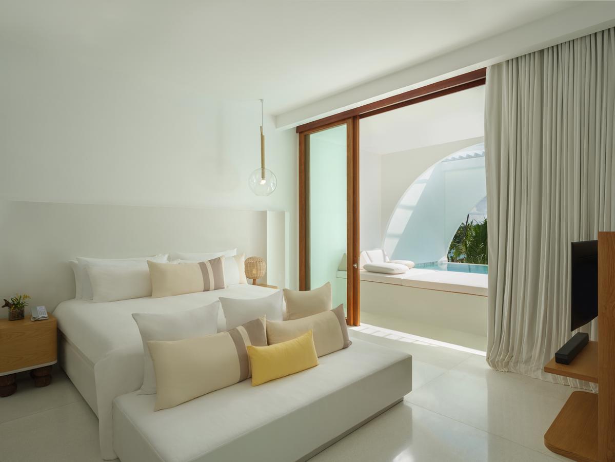 Sala Samui Chaweng Beach Resort Esterno foto A bedroom at the hotel